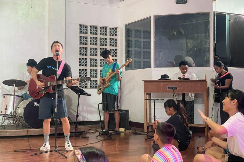 Reeracoen, +one and CMSP participants with children during the 2026 +one visit to CMSP Children’s Village in the Philippines.