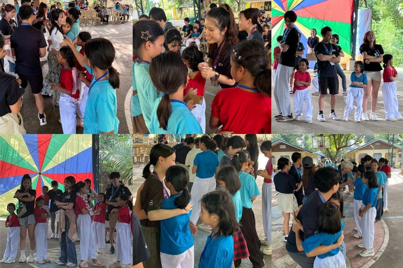 Reeracoen, +one and CMSP participants with children during the 2026 +one visit to CMSP Children’s Village in the Philippines.