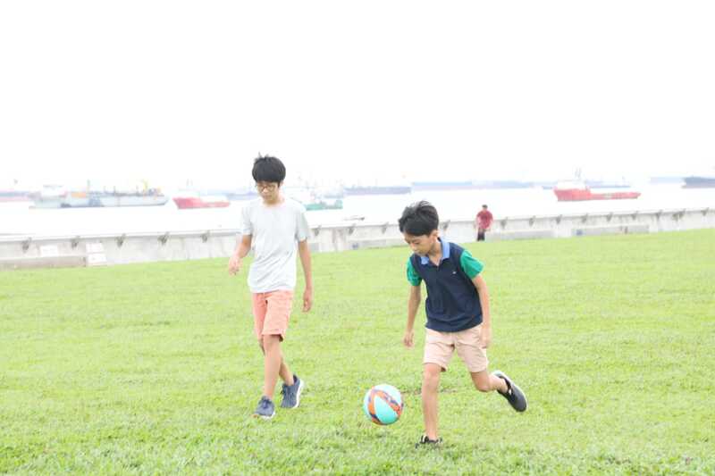 Shiho-san's sons playing soccer